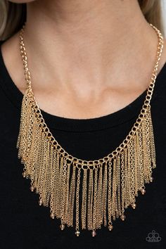 Sporadically dotted in golden crystals, a mismatched collection of shimmery gold chains swings from the bottom a classic gold chain below the collar, creating a tapered fringe. Features an adjustable clasp closure.

 Sold as one individual necklace. Includes one pair of matching earrings. Tapered Fringe, Heart Frame, White Crystals, Fringe Necklace, Ball Necklace, Paparazzi Accessories, White Rhinestone, Classic Gold, Silver Bars