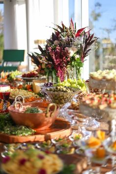 a table filled with lots of different types of food