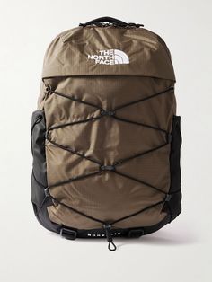 the north face backpack in brown and black