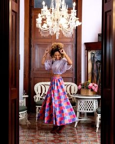 Enjoy summer to the fullest in our Swann organza crop top and printed skirt set! Two Piece top and skirt set Sheer crop Organza Top with elastic band Full length skirt Elastic waist band Color Lilac - Multi Dry Clean Model is wearing a Small.