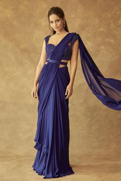 Luxury Bollywood Pre-draped Saree With Padded Blouse, Luxury Bollywood Pre-draped Saree With Motifs, Luxury Bollywood Style Pre-draped Saree With Traditional Drape, Luxury Art Silk Pre-draped Saree With Zari Work, Luxury Designer Wear Pre-draped Lehenga, Luxury Saree With Draped Sleeves, Luxury Blue Blouse For Reception, Luxury Pre-draped Saree With Resham Embroidery, Luxury Anarkali Style Pre-draped Saree For Traditional Ceremonies