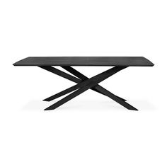 a black table with two crossed legs