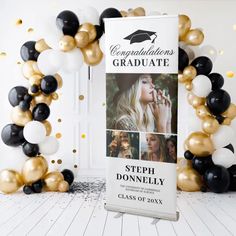 a graduation banner with balloons and confetti in the background