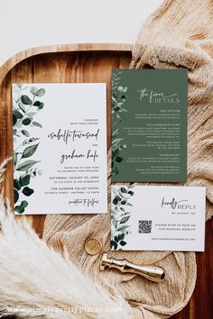 wedding stationery with greenery and calligraphy