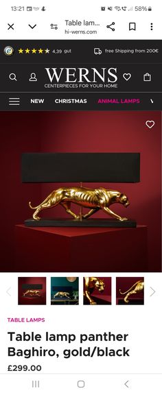 the website for an art gallery with gold and black items on it, including a table lamp