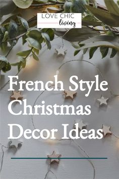 french style christmas decor ideas with greenery and lights on the wall in front of it