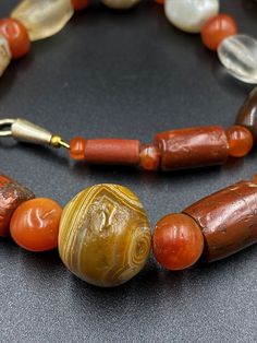 A beautiful old Ancient Antique Himalayan Indo Tibetan Necklace mala of carnelian Agate Sualamani , crystals beads The age of this beads are more than 1000 years old They were used in ancient times in prayers mala and in jewelry They were used as trade beads as well we provide fast and free shipping service world wide Traditional Carnelian Gemstone Necklaces, Traditional Carnelian Gemstone Beads, Carnelian Amulet Necklace With Round Beads, Antique Carnelian Necklaces With Natural Stones, Antique Carnelian Necklace With Natural Stones, Carnelian Amulet Necklace With Large Beads, Carnelian Amulet Beaded Necklace For Healing, Traditional Amber Gemstone Beads And Cabochons, Traditional Amber Gemstone Beaded Necklace