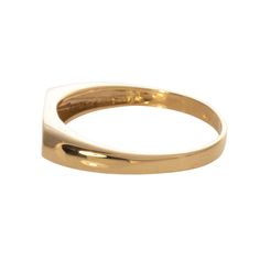 This signet ring features an oval-shaped bar signet in polished 18K yellow gold. Classic Oval Engraved Ring For Formal Occasions, Oval Hallmarked Signet Ring For Formal Occasions, Classic 14k Gold Signet Ring For Formal Occasions, Formal Oval Hallmarked Signet Ring, Classic Oval Signet Ring With Polished Finish, Classic Signet Ring With Polished Finish For Anniversary, Modern 14k Gold Signet Ring With Polished Finish, Classic Anniversary Signet Ring With Polished Finish, Timeless Polished Signet Ring For Everyday