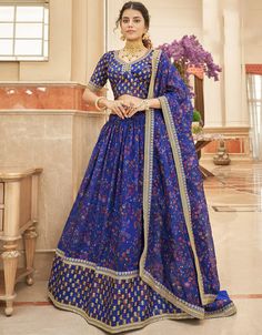 🔥 Indulge in the sweetness of Blueberry with the Lehenga Style Choli from Arabic Attire! 🫐✨ This stunning ensemble is a perfect choice for those who want to add a pop of color to their wardrobe. #LehengaLove #Blueberry #SlayInStyle #ArabicAttire #ColorfulChic #FashionGoals #LehengaCholi #MustHave #VibrantBeauty #FashionFever Organza Floral Lehenga, Digital Print Lehenga, Lehenga Designs Latest, Heavy Lehenga, Print Lehenga, Lehenga Choli Designs, Indian Wedding Lehenga, Printed Organza, Reception Lehenga