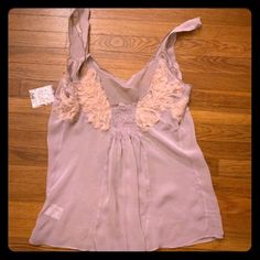 Nwt Free People New Romantics Gauze Boho Top. Features Relaxed/Loose Fit, Scoop Neck, Embellished With Cloth Overlay On Sides And Rear, Elastic Gathering On Upper Back, Adjustable Button Straps. Msrp $98.00 Measurements Taken While Garment Lay Flat 13" Shoulder To Shoulder 15" Armpit To Armpit 16" Long Soooooooo Gorgeous! Elegant Purple Camisole For Summer, Elegant Purple Summer Camisole, Purple V-neck Tank Top For Party, Spring Party Purple Camisole, Purple V-neck Top With Built-in Bra, Purple Camisole For Night Out In Spring, Feminine Purple Sleeveless Camisole, Purple Tops With Built-in Bra For Night Out, Chic Fitted Purple Camisole