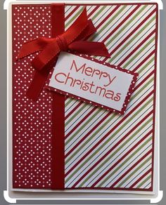 a christmas card with red and green stripes