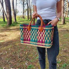 Colorful Reed Bag SMALL SIZE Dimensions: L - 35 cm, W - 14 cm, H - 22 cm L - 13,8 in, W - 5,5 in, H - 8,7 in MEDIUM SIZE Dimensions: L - 39 cm, W - 16 cm, H - 28 cm L - 15,6 in, W - 6,3 in, H - 11,0 in LARGE SIZE Dimensions: L - 45 cm, W - 20 cm, H - 30 cm L - 17,7 in, W - 7,9 in, H - 11,8 in The dimensions may vary slightly Summer Bags Beach, Boho Basket, Bohemian Bag, Summer Bag, Basket Bag, Market Bag, Shopper Bag, Large Bags, Small Bags