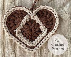 two crocheted hearts hanging from a string on a white background with the text, free pattern