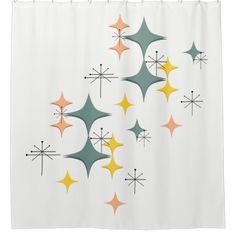 a shower curtain with many different colored stars on it