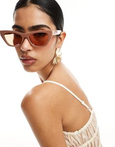 Accessories by AJ Morgan Keep those rays at bay Cat-eye frames Molded nose pads Light-tinted lenses Standard arms