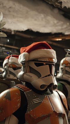 star wars characters dressed up in costumes for the christmas holiday season, wearing santa hats