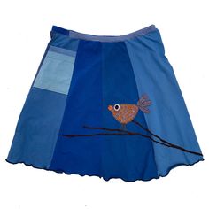 "Classic Appliqué skirts are made with high quality, up-cycled t-shirts. Freestyle sewn images are appliquéd on panels of various colors making each skirt unique and interesting.  Each skirt has a convenient pocket. Since there is no real \"front\" or \"back\"of this skirt, simply place the pocket where you like. The 21\" length, a-line cut, elastic waist and up-cycled knit fabric create an ultra comfortable skirt that will be your best friend all year long. EACH SKIRT IS MADE TO ORDER AND UNIQU Applique Skirt, Comfortable Skirts, Cycling T Shirts, Cycling T-shirt, Cute Birds, Elastic Waist, Knitted Fabric, Womens Skirt, Knitting