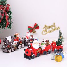 a christmas scene with santa claus driving a train