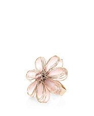 a pink flower ring on a white background