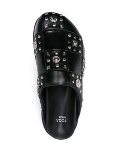 Toga Virilis stud-detailing Leather Mules - Farfetch Leather Studded Slip-on Sandals, Leather Slip-on Sandals With Studs, Casual Leather Sandals With Studs, Leather Studded Slip-on Mules, Black Studded Mules With Round Toe, Black Leather Studded Mules, Luxury Studded Sandals With Round Toe, Luxury Studded Round Toe Sandals, Leather Slip-on Sandals With Studded Rubber Outsoles