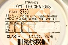 the label for home decorators shows that it is white and has black letters on it