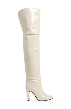 An almond toe and tapered heel balance a striking boot fashioned in an over-the-knee silhouette for statement-making appeal. 3 3/4" heel (size 8.5) 25" shaft; 15 1/4" calf circumference Pull-on style Synthetic upper/leather and textile lining/synthetic sole Imported Chic Cream Knee-high Boots With Pointed Toe, Chic Cream Pointed Toe Knee-high Boots, Cream Knee-high Heeled Boots For Fall, Chic Beige Knee-high Boots With Pointed Toe, Cream Knee-high Boots For Spring, Elegant White Knee-high Boots, Fitted Cream Knee-high Heeled Boots, Chic White Knee-high Boots For Fall, Chic Tall Heeled Boots For Evening