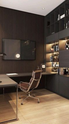 a room with a desk, chair and bookcases on the wall next to it