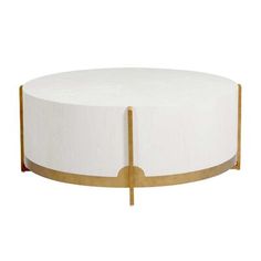 a white and gold coffee table with two circular bases on the top one is round