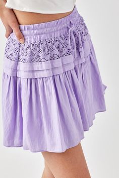 Introducing our Trim Lace with Folded Detail Skirt, a sophisticated and elegant addition to your wardrobe. This skirt is designed with meticulous attention to detail, featuring delicate lace trim and folded accents that add a touch of femininity and refinement to your look. Size + Fit- Model is wearing size S- Measurements taken from size S- 5'9" / 175CM- 32-24-34 Style: Boho Print / Pattern: Contrast Silhouette: Skirt Fit: Relaxed Embellishment: Trim Lace Length: Mini Closure: Drawstring Lining: Yes Made In: CHINAFabric Contents: Self: 50% Polyester, 50% RayonLining: 100% Rayon Non-stretch fabric Non-sheer fabric Care Instructions: Machine wash cold, gentle cycle, tumble dry low.Size Measurement (inch): S: 25.0 (Waist), 36.0 (Hips), 15.0 (Length) M: 26.0 (Waist), 37.0 (Hips), 15.5 (Length Feminine Tiered Skirt With Lace Patchwork, Spring Dresses With Lace Patchwork And Flowy Skirt, Spring Lace Patchwork Skirt, Elegant Dress With Lace Patchwork And Flowy Skirt, Spring Flowy Lace Patchwork Skirt, Spring Flowy Skirt With Lace Patchwork, Spring Skirt With Lace Patchwork, Elegant Summer Skirt With Lace Patchwork, Feminine Lace Flowy Skirt