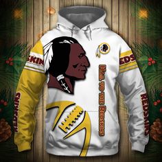 the washington football team hoodie is shown on a wooden background with pine branches and pine cones