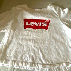 Levis Short Tshirt!! Nwot!! Levi's White Short Sleeve Shirt, Levi's White Cotton Top, Casual White Levi's Top, White Cotton Levi's Top, Levi's Logo Print Crew Neck Top, Levi's Red Crew Neck Top, White Levi's T-shirt For Summer, Levi's White Graphic Print T-shirt, Levi's White Graphic Tee