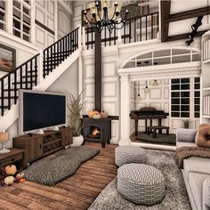 a living room filled with furniture and a flat screen tv mounted on a wall next to a fire place