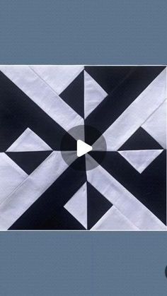 an abstract black and white design on a blue background with the text,'this is how we do quilts '