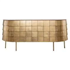 a gold colored sideboard with squares on it