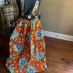 Never Worn, Beautiful African Print Maxi Skirt With Pockets. Elastic Waist In Back. Casual Orange Skirt For Vacation, Orange Cotton Skirt For Vacation, Orange Floral Print Long Skirt, Bohemian Orange Floral Print Skirt, Casual Orange Floral Print Skirt, Fitted Orange Vacation Skirt, Fitted Orange Maxi Skirt For Beach, Fitted Orange Maxi Skirt For The Beach, Fitted Orange Skirt For Vacation