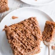 two pieces of cake sitting on top of a white plate