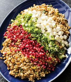 a blue plate topped with lots of food