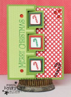 a handmade christmas card with candy canes and polka dot paper on it,