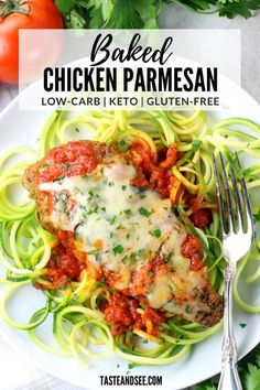 baked chicken parmesan on a plate with zucchini noodles