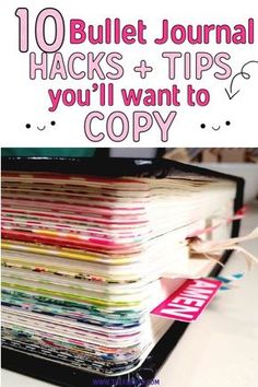 a stack of magazines sitting on top of a desk