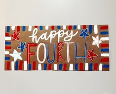 a fourth of july banner hanging on a wall with the words happy fourth written in red, white and blue