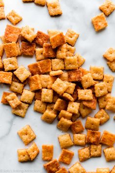 some kind of food that is on top of a white countertop and has been cut into cubes