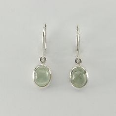 This is a  beautiful pair of green Prehnite Earrings in 925 Sterling Silver. They are made out of Sterling Silver with no nickel so there should be no allergic reaction and nothing will turn green. The silver is not only silver plated or steel but solid 925 Sterling Silver. We usually ship the same in a nice gift box. Green Gemstone Oval Cabochon Earrings, Green Oval Cabochon Gemstone Earrings, Everyday Green Sterling Silver Earrings, Green Oval Nickel-free Earrings, Blue Topaz Earrings, Allergic Reaction, Topaz Earrings, Sterling Silber, Solid 925 Sterling Silver