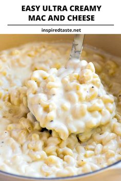 a ladle full of macaroni and cheese being stirred with a spoon in a pot