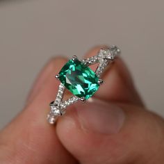 This is a gorgeous handmade creation. Its beauty is its simplicity & Elegance. The 6*8mm cushion cut lab emerald is crafted in sterling silver with rhodium plated. It's made to order and it will take about 7-10 days to make it. All item is sent in a beautiful gift box You can realize more lovely stuff clicking the link https://www.etsy.com/shop/knightjewelry?refshopsection_shophome_leftnav Please leave the correct address and you phone number for delivering successfully. Silver Emerald Ring With Cushion Cut, Cushion Cut Emerald Green Rings, White Gold Cushion Cut Emerald Ring, Silver Cushion Cut Ring With May Birthstone, Green Cushion Cut Emerald Ring With Accent Stones, Silver Cushion Cut Ring For May Birthstone, Fine Jewelry Cushion Cut Emerald Ring, Fine Jewelry Emerald Cushion Cut Ring, Silver Emerald Ring Cushion Cut Fine Jewelry