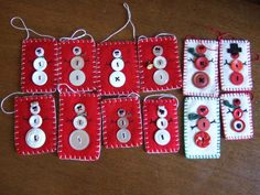 red and white fabric with buttons on them sitting on a wooden table next to twine string