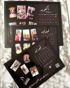 several pictures and magnets are arranged on a marble counter top with the date in arabic