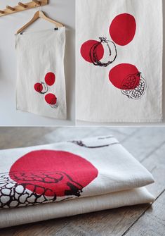 three pictures of red and white fabric hanging on clothes pins, with the same design