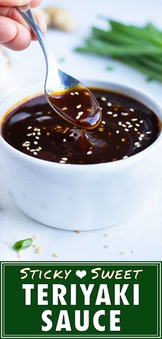 a spoonful of teriyaki sauce in a white bowl