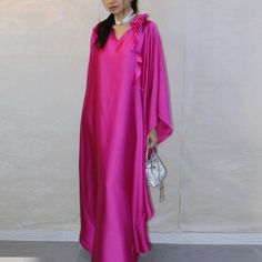 This Satin luxury kaftan dress is a true show stopper. This woman's evening maxi dress is a wardrobe must have. Looking for a loose fitting holiday dress, this large (plus size) black kimono frock dress will fit your needs. Size up to US 24       (Please contact us, if you need a custom size.) * Chest : free up to 32 - 58" * Waist : free up to 58" * Hips : free up to 56" * Length : 57" from shoulder to hem (measured when laying flat) Kaftan shown in the video is the petite to small version kaftan dress MATERIAL : * Satin > soft and comfortable to wear, not as slippery as spandex. * No lining NOTE : * Model chest : 32", waist : 24" hips : 35" * Combined Height is 5"6 > I'm 160 cm (5"2) and I'm wearing 4" heels in the pictures * Accessories excluded CARE INSTRUCTIONS : * Wash separate in Col Evening Spring Maxi Length Kaftan, Elegant V-neck Formal Abaya, Spring Party Kaftan With Kimono Sleeves, Silk Maxi Kaftan For Parties, Elegant V-neck Party Abaya, Elegant Floor-length Kaftan For Parties, Spring Party Tunic Kaftan, Elegant Floor-length Party Kaftan, Spring Evening V-neck Kaftan